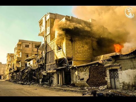 شاهد قصف داريا بالبراميل المتفجرة والنابالم
