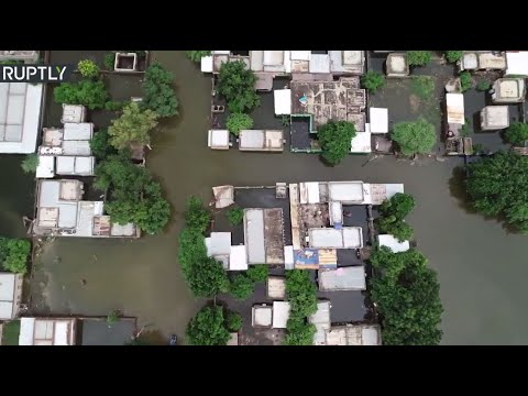 شاهد فيضانات النيل الأزرق تسبب في غرق مدينة سنجة في السودان